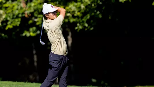 Jacob Goode follows shot after hitting the ball