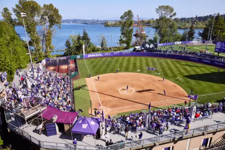 The University of Washington softball team plays Nebraska on April 26, 2025. (Photography by Blake Dahlin/Red Box Pictures)