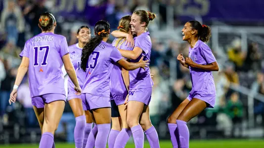 Lucy Newlin celebrates with Maylen Montoya following a goal