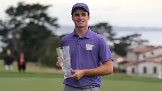Hamish Farquharson holds the Saint Mary's Invitational Individual Trophy