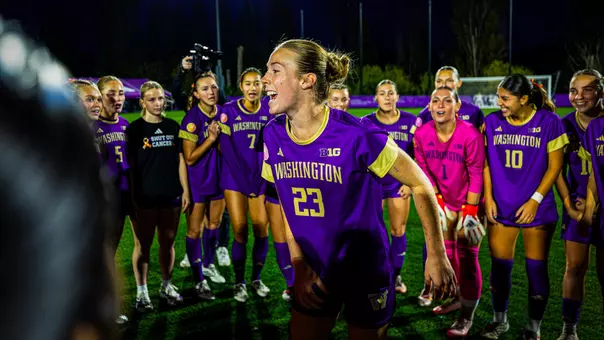 Lucy Newlin in the pregame huddle vs. Iowa