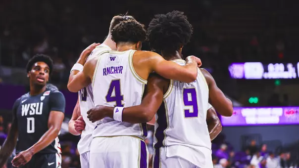 Team huddle in exhibition vs. Washington State