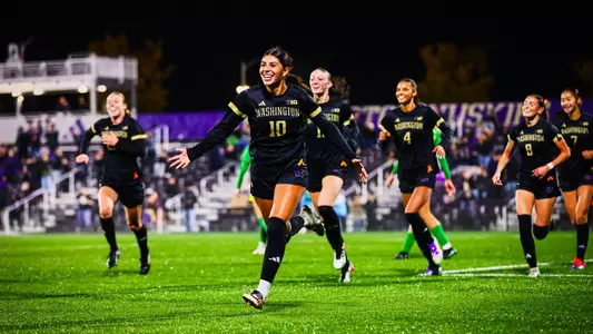 Andrea Leyva races to the corner flag to celebrate the winning goal over Oregon