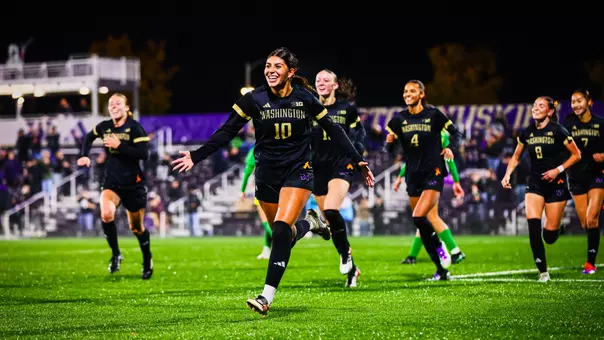 Andrea Leyva races to the corner flag to celebrate the winning goal over Oregon