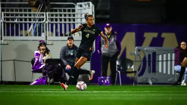 Maya Loudd dribbles down the sideline versus USC