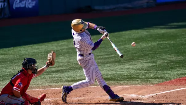 Ethan Swidler hits a home run against Houston in the Puerto Rico Baseball Challenge