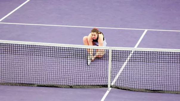 Carina Syrtveit awaits serve versus San Diego