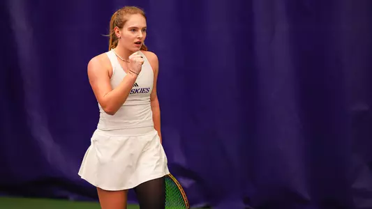 Marie Weissheim celebrates a point