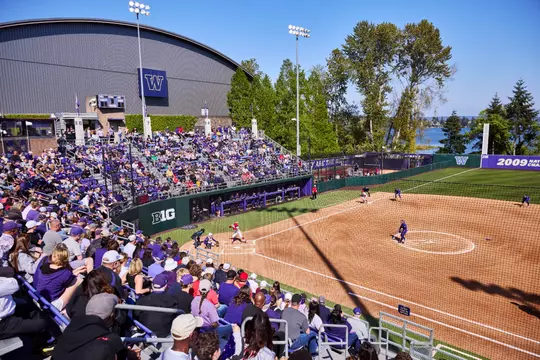 The University of Washington softball team plays Nebraska on April 26, 2025. (Photography by Blake Dahlin/Red Box Pictures)