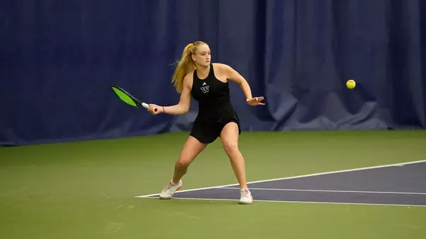 Reece Carter prepares to hit the ball