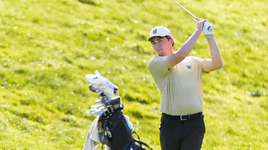 Grady Millar hits an approach shot