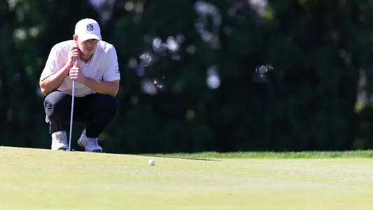 Grady Millar reads a putt at The Desimone Invitational