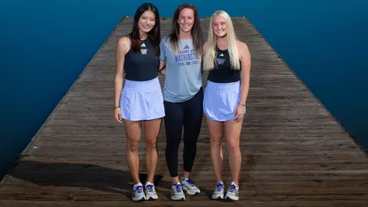 Erika Matsuda, Robin Stephenson and Reece Carter stand on the conibear dock