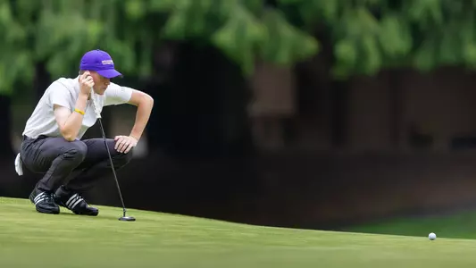 Jack Murphy reads a putt