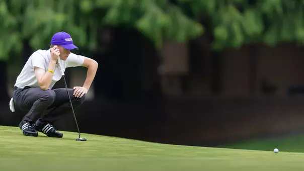Jack Murphy reads a putt