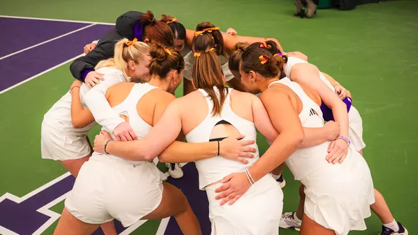 Women's tennis team huddle