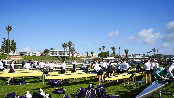 Washington rowers prepare their rowing shells at Mission Bay in San Diego in 2025