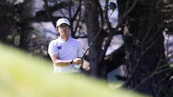 Jacob Goode watches his tee shot