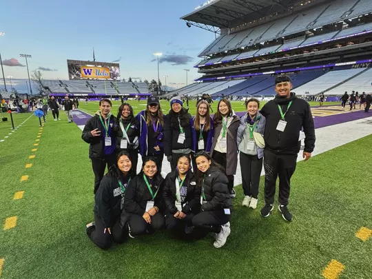 Marketing interns at the Husky stadium