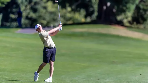 Finn Koelle hits an approach shot