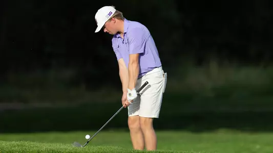 Emil Herstad chips the ball out of the rough at The Goodwin