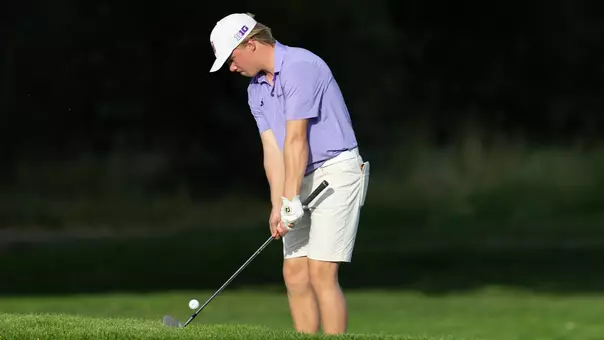 Emil Herstad chips the ball out of the rough at The Goodwin