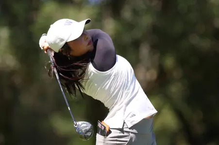 Carmen Lim mid swing