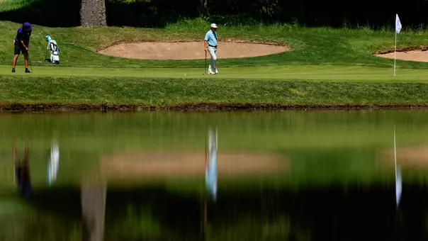 Jacob Goode hits a long putt during the Big Ten Championships