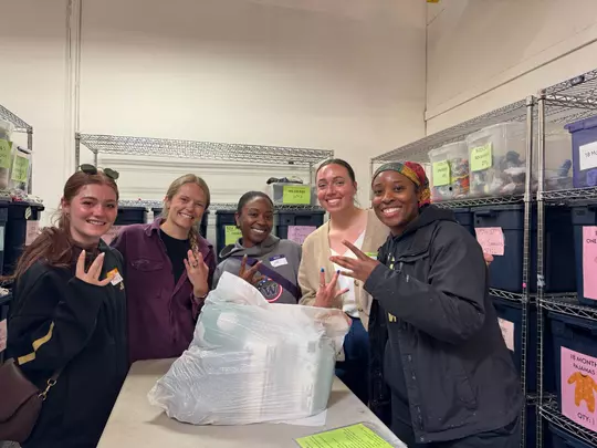 UW staff volunteering at West Side Baby