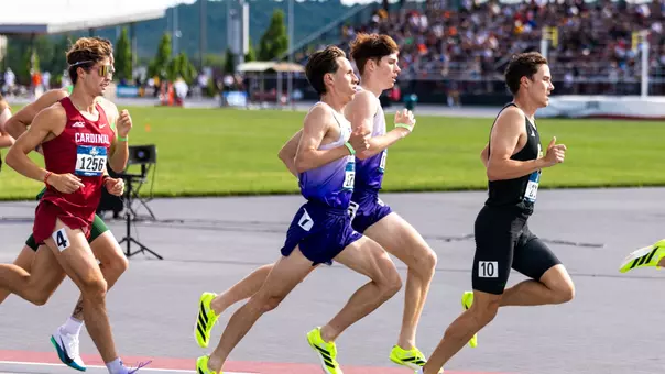 Reuben Reina and Martin Barco side by side in the 1500m quarterfinals