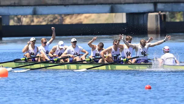 Washington's men's varsity 8 celebrates as it crossed the finish line to win the 2026 IRA Championship at Lake Natoma