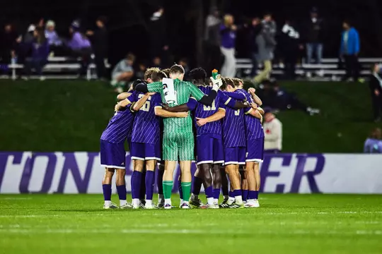 MEN'S SOCCER HUDDLE