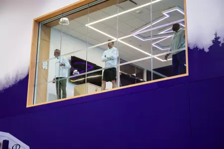 UW men's basketball coaches watching practice