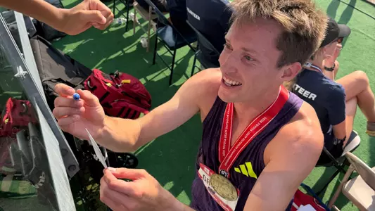 nathan green signing autographs after winning the usa 1500m title