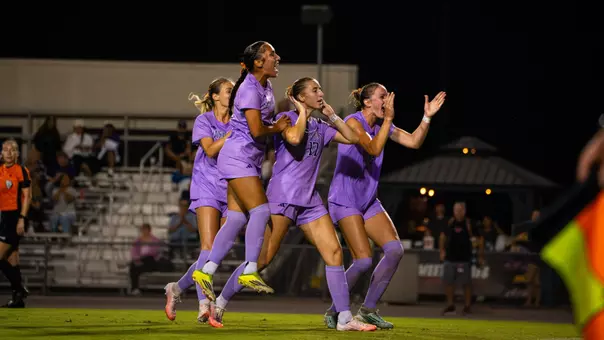 Jadyn Holdenried, Samiah Shell and Alex Buck celebrate a goal at San Diego State