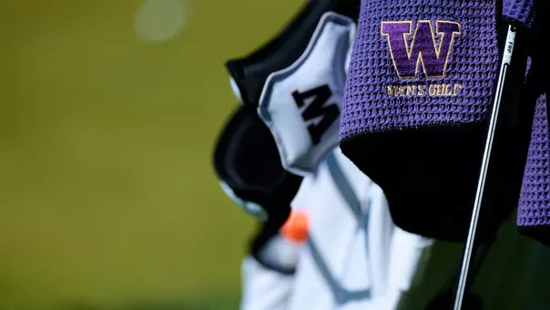 Close up shot of a W logo men's golf towel on a golf bag