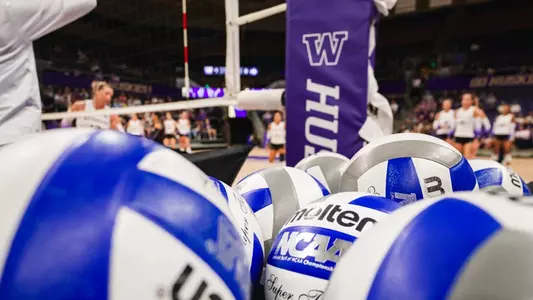 Volleyballs by the net post in Alaska Airlines Arena