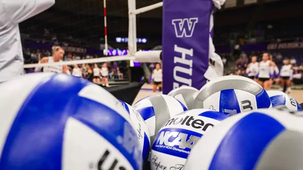 Volleyballs by the net post in Alaska Airlines Arena