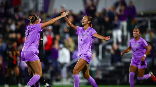 Angelica Chou and Jadyn Holdenried celebrate a goal versus Maryland