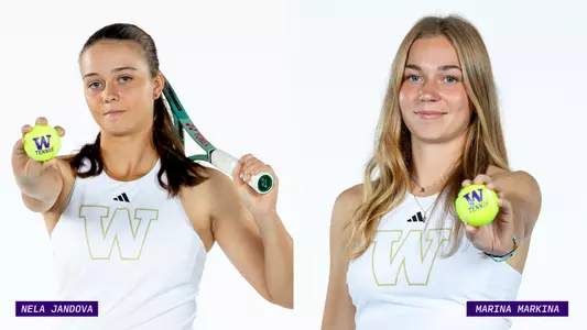 Nela Jandova and Marina Markina hold out tennis balls in front of a white backdrop