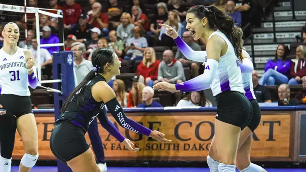 Kaitlyn Nguyen and Simona Mateska celebrate a point