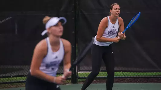 Alexia Jacobs and Marie Weissheim prepare for doubles in the Round of 16 at the ITA All-American Championships