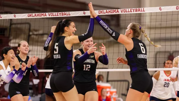 Mateska and Fabikovicova high-five after a point in Oklahoma