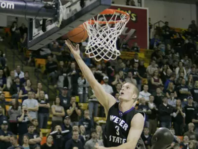 Wildcats Fall to Utah State, 85-73, In Championship Game of The Basketball Travelers Invitational