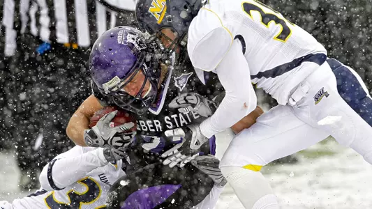 Tuckett Leads Wildcats to Win on Mac's Last Home Game