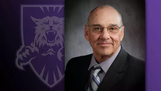 John L. Smith announces first coaching hires