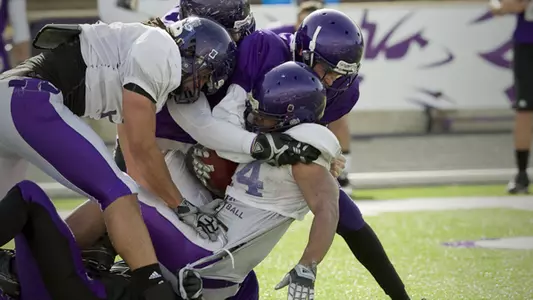 Defense Leads in Purple and White Game