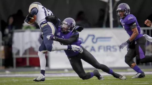 'Cats send seniors out with 34-21 win over Bears