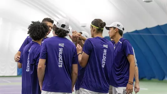 Men's Tennis team during a match against Omaha