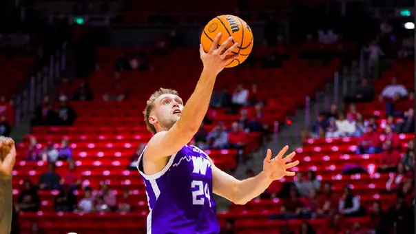 Jace Whiting shoots a layup against Utah in 2025